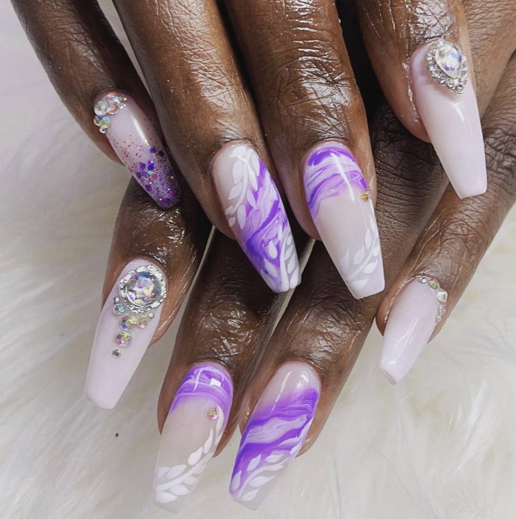 Purple floral nail design